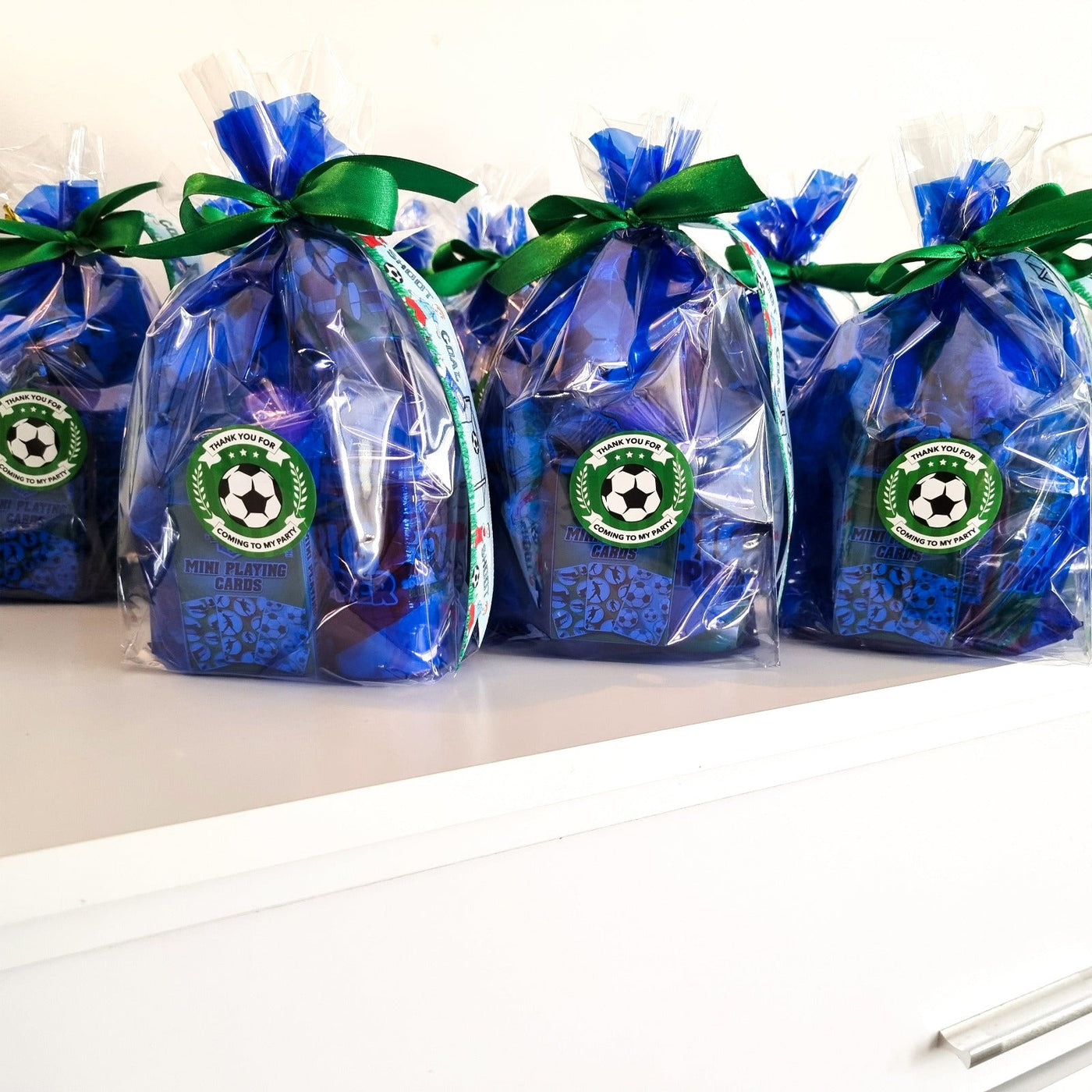 Pre-filled Blue Football Party Bags For Children. Party Favours With Sweets And Toys.